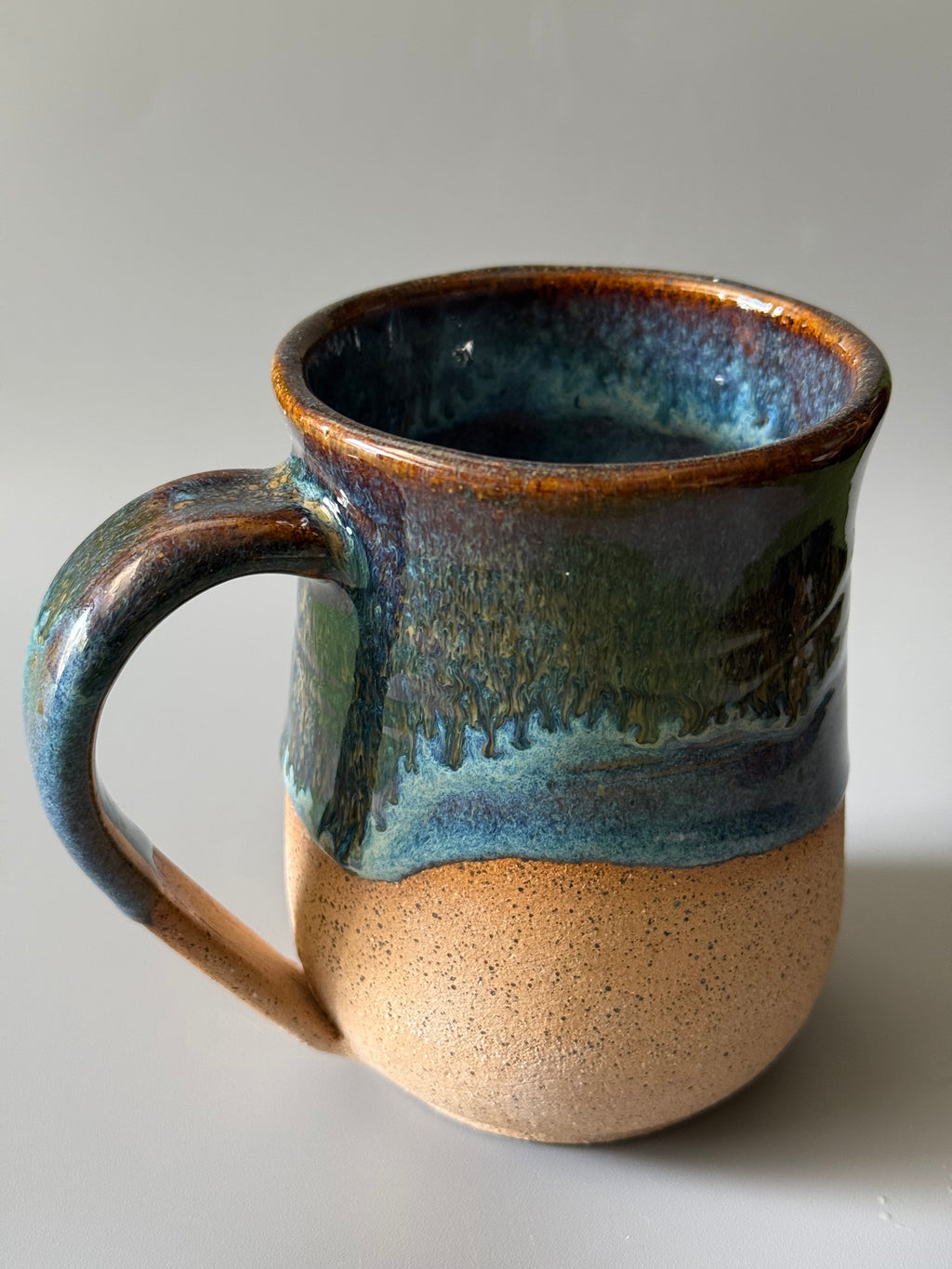 Handmade Blue mug with drip glaze, bare speckled clay 10-12 oz