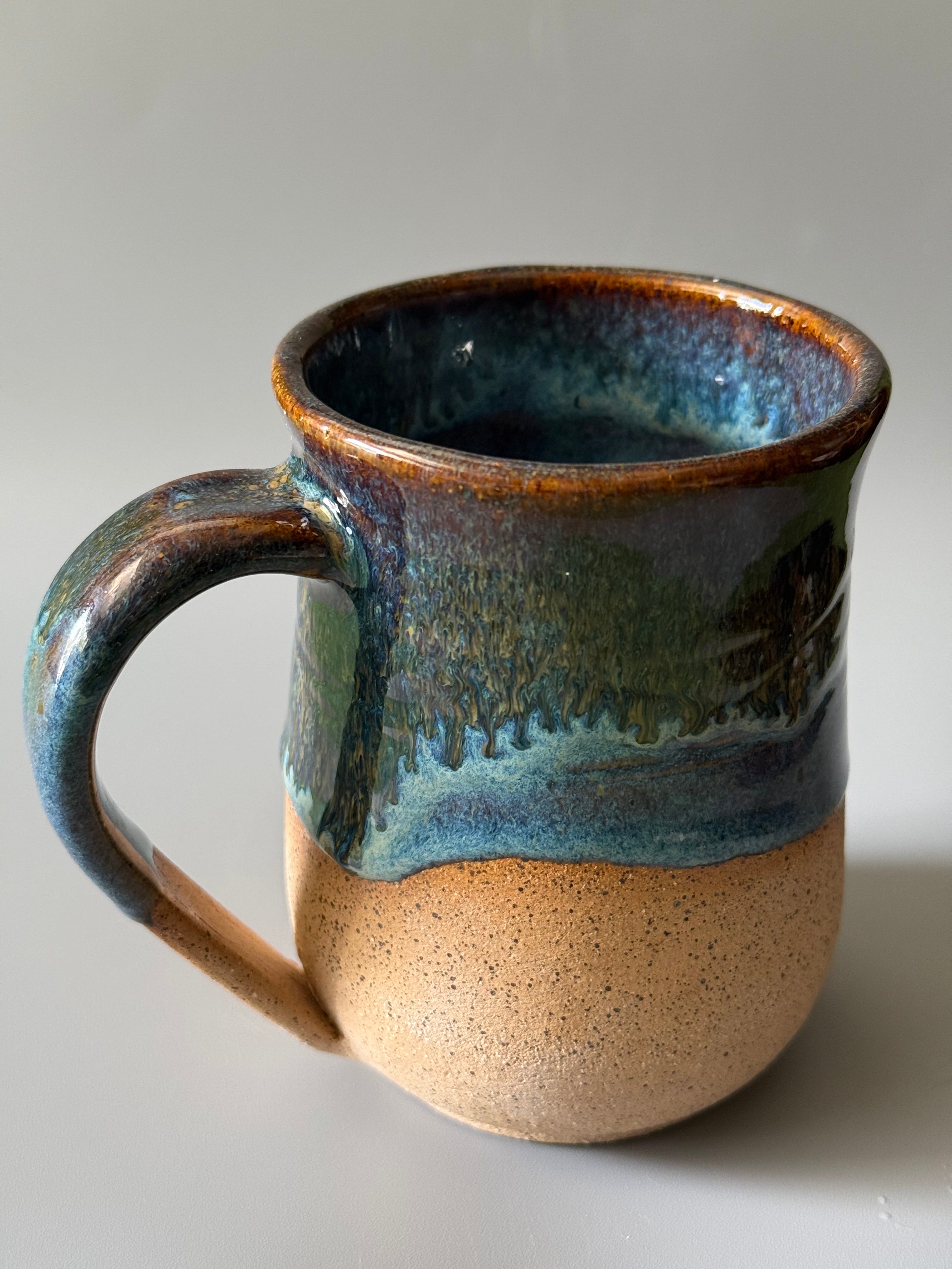 Handmade Blue mug with drip glaze, bare speckled clay 10-12 oz
