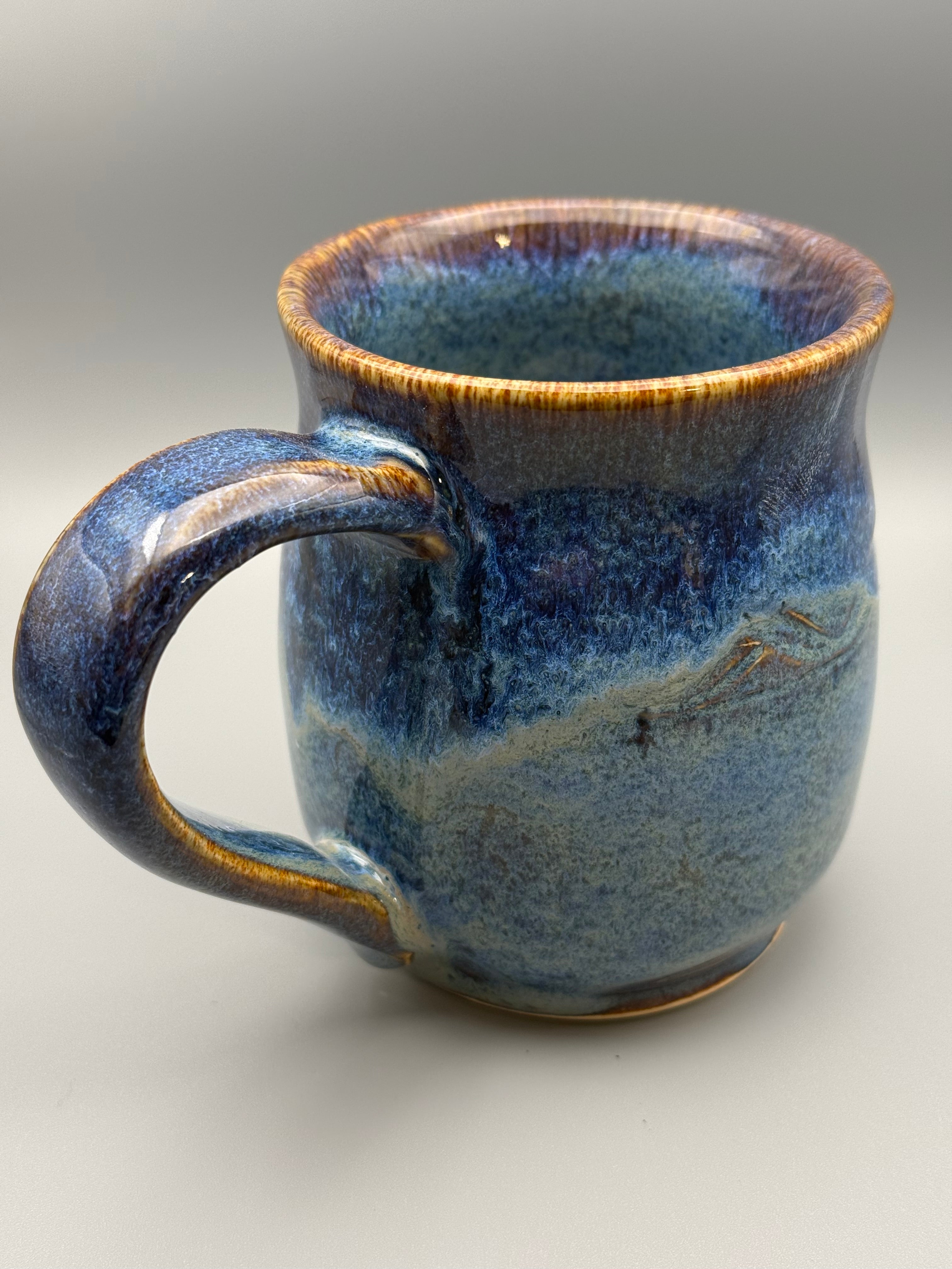 Blue surf pottery mug 10-12 oz
