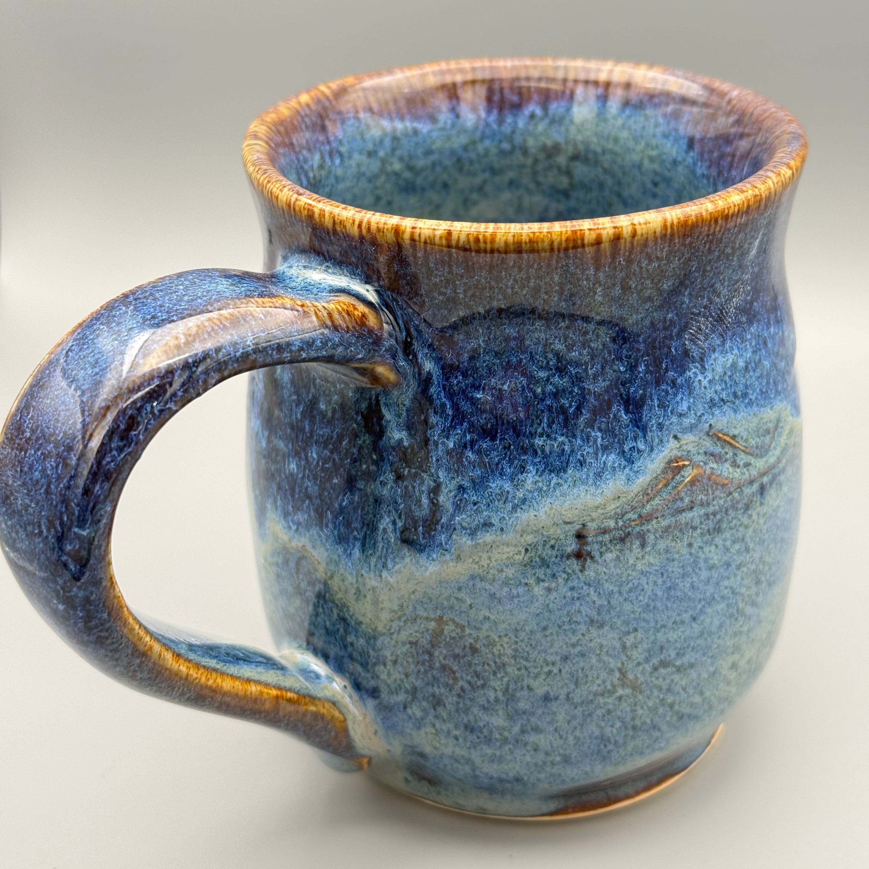 Blue surf pottery mug 10-12 oz