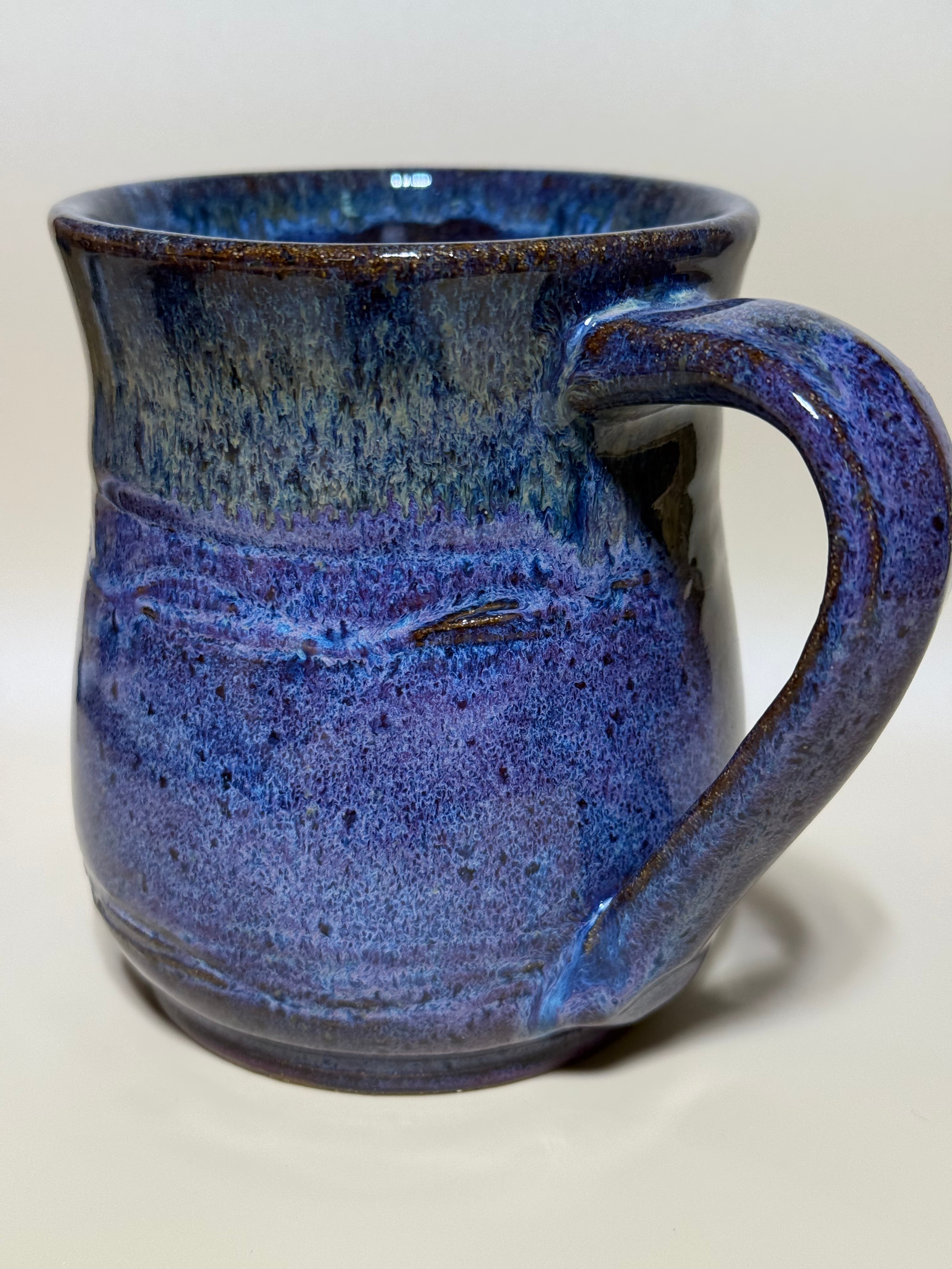 Purple and gold mug on speckled clay. Handmade 10-12 oz