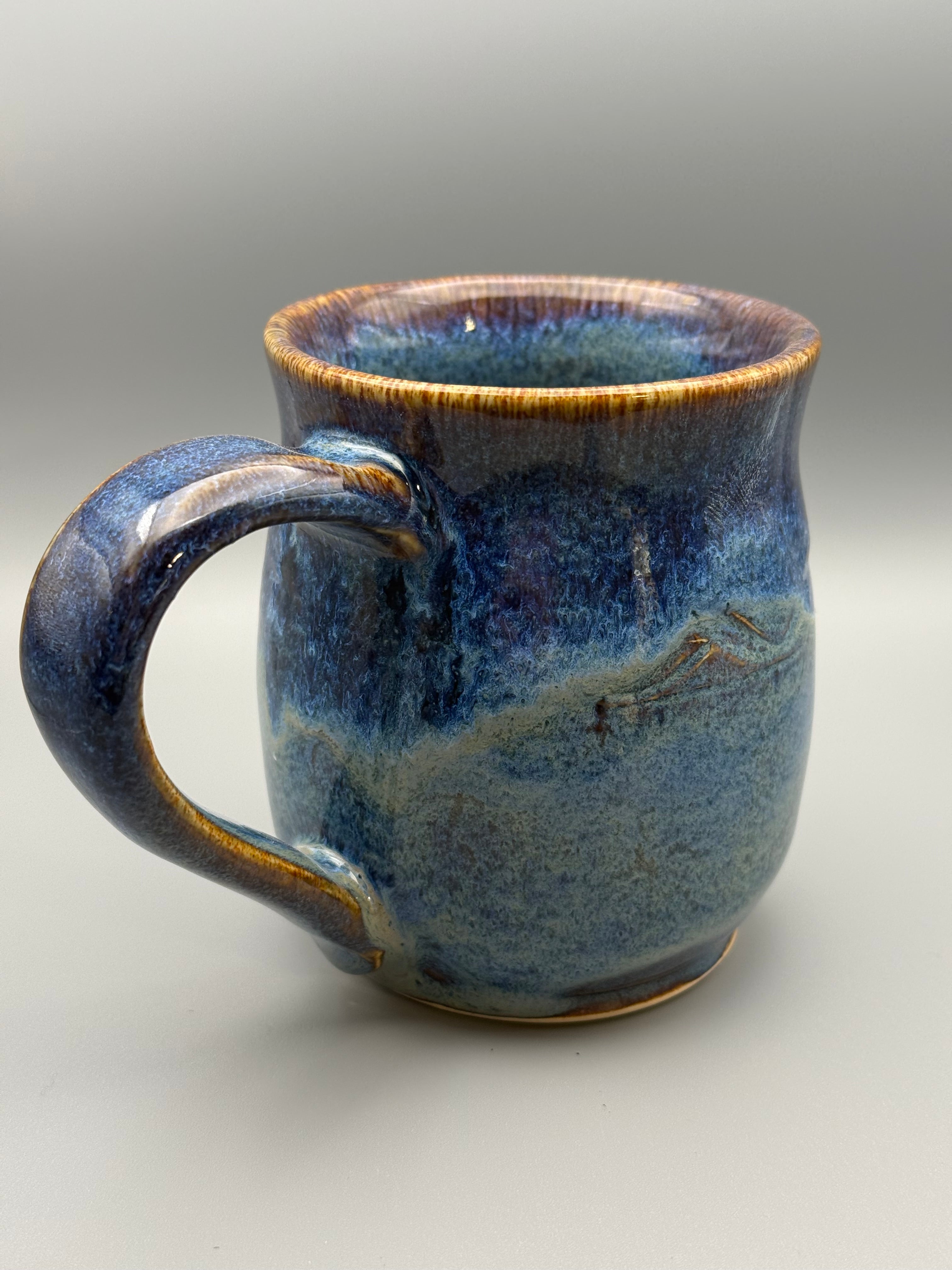 Blue surf pottery mug 10-12 oz