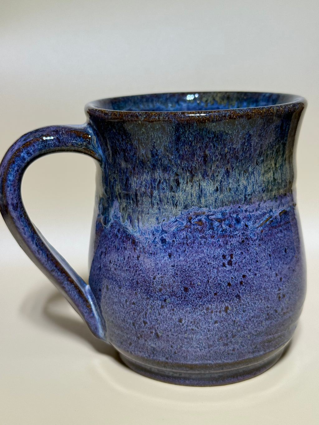 Purple and gold mug on speckled clay. Handmade 10-12 oz