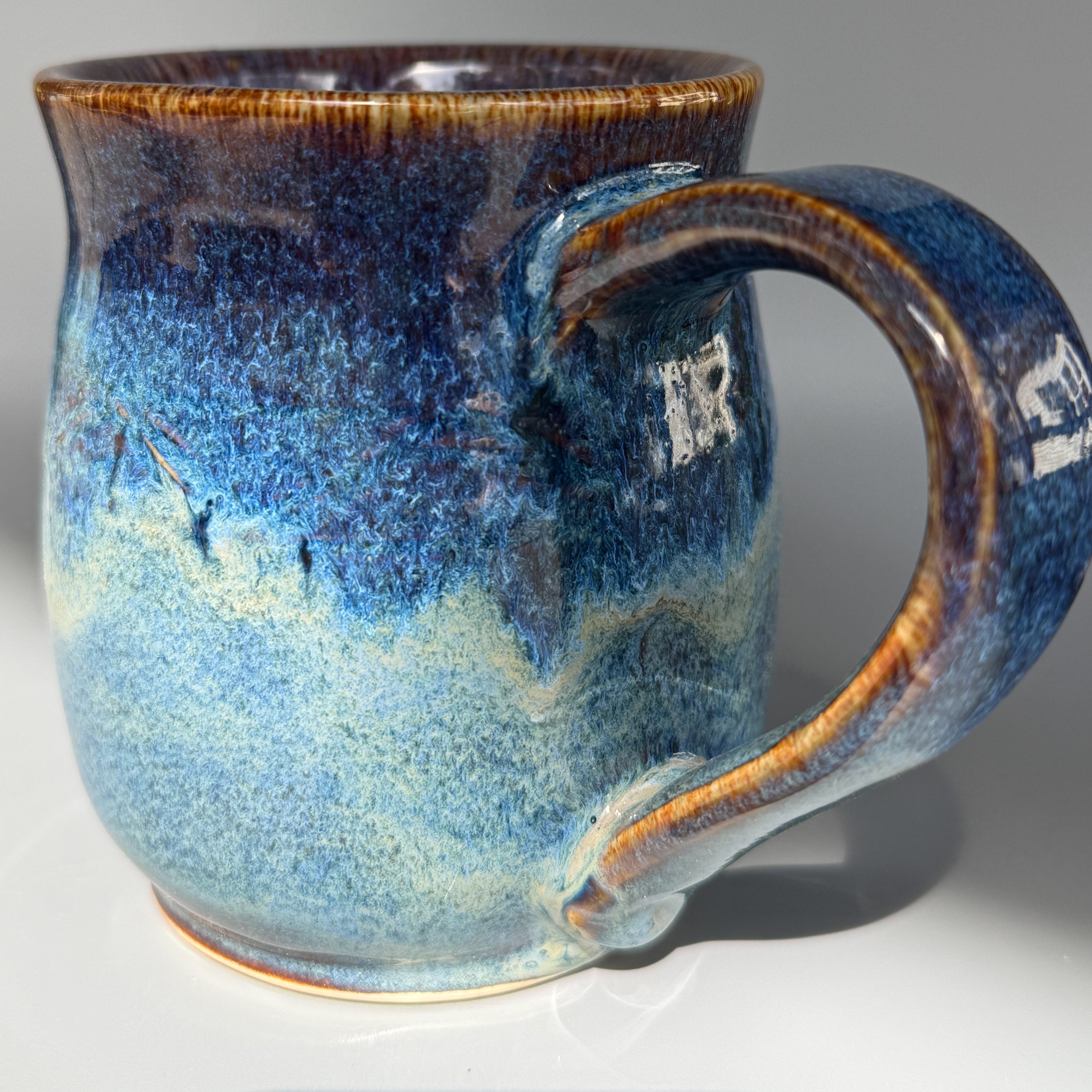 Blue surf pottery mug 10-12 oz