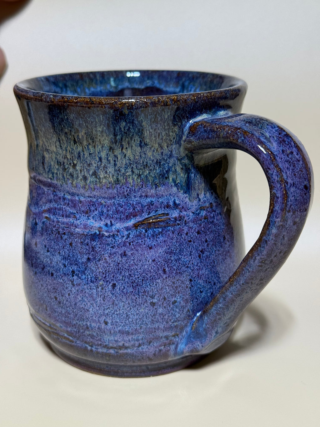 Purple and gold mug on speckled clay. Handmade 10-12 oz