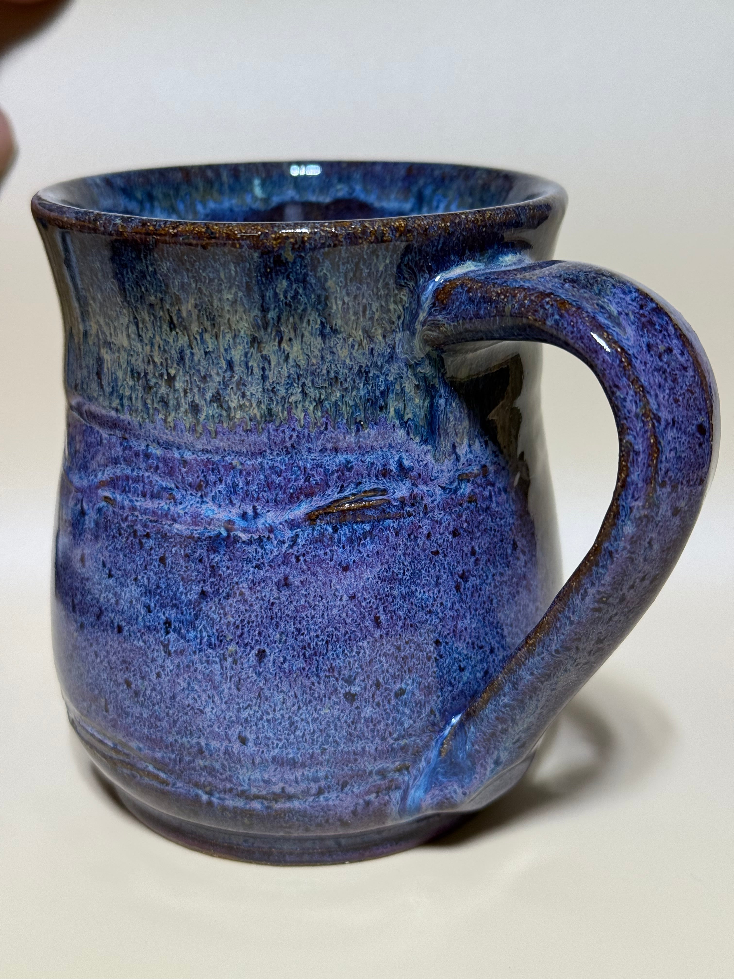Purple and gold mug on speckled clay. Handmade 10-12 oz