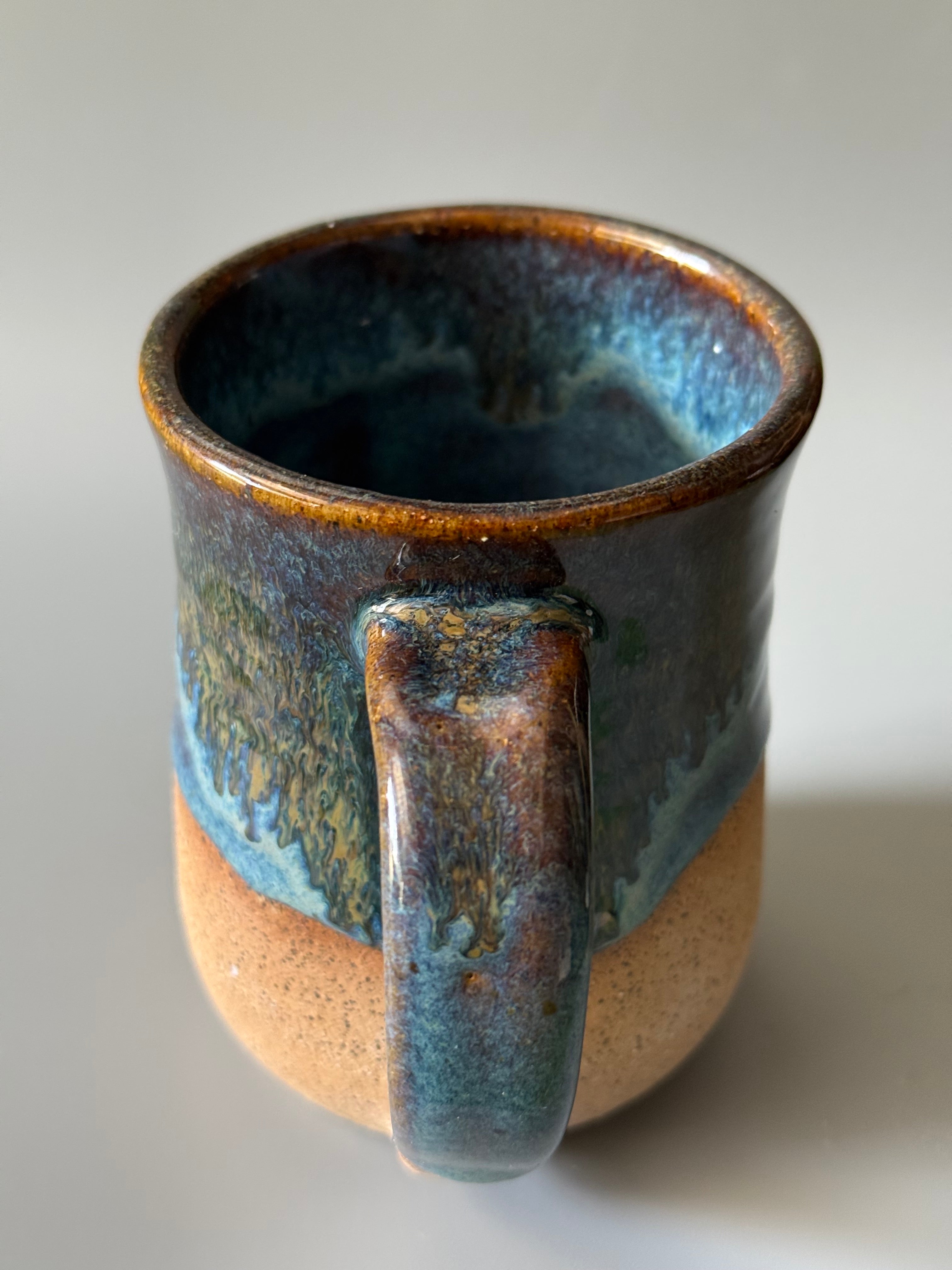 Handmade Blue mug with drip glaze, bare speckled clay 10-12 oz