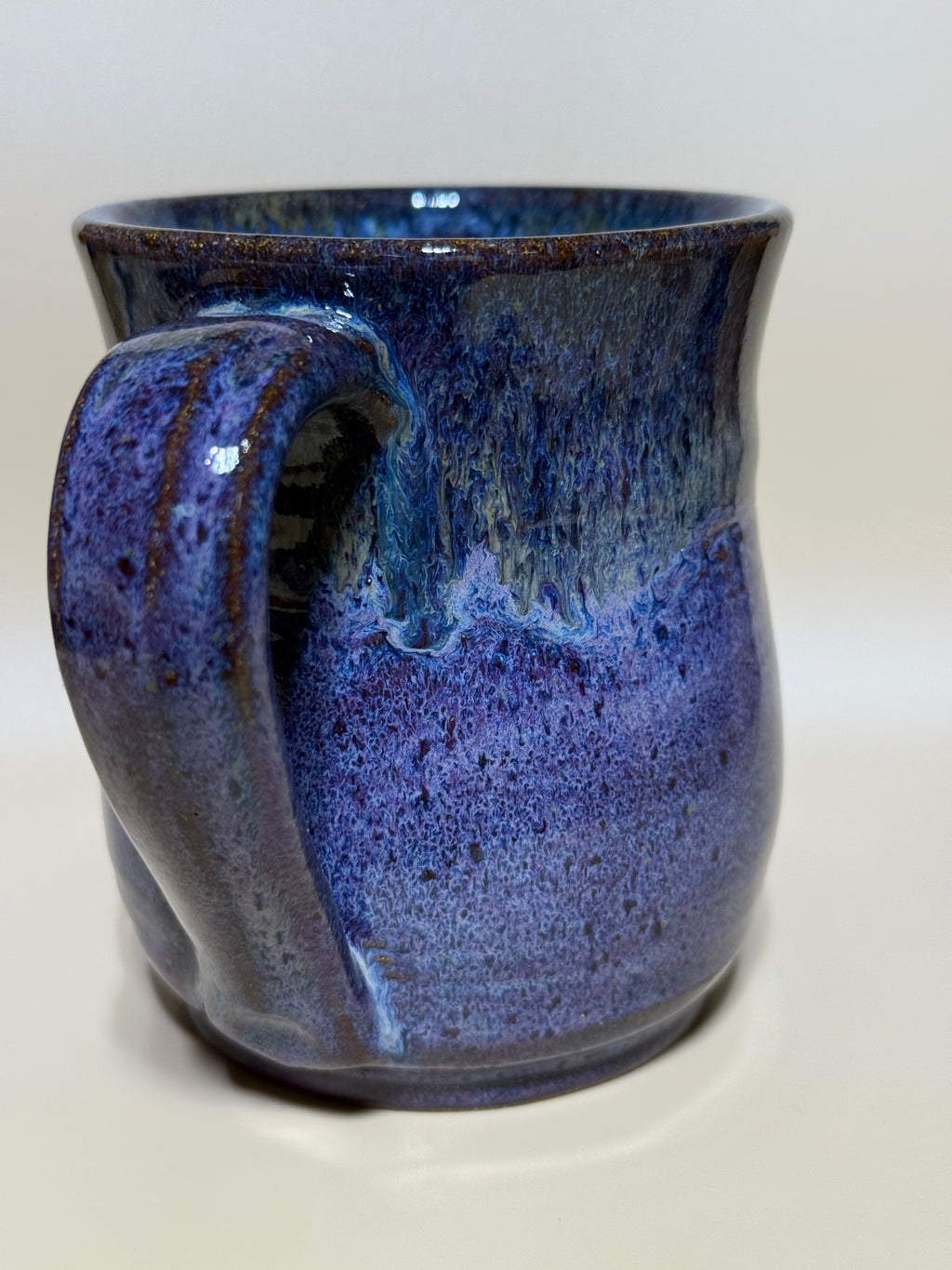 Purple and gold mug on speckled clay. Handmade 10-12 oz