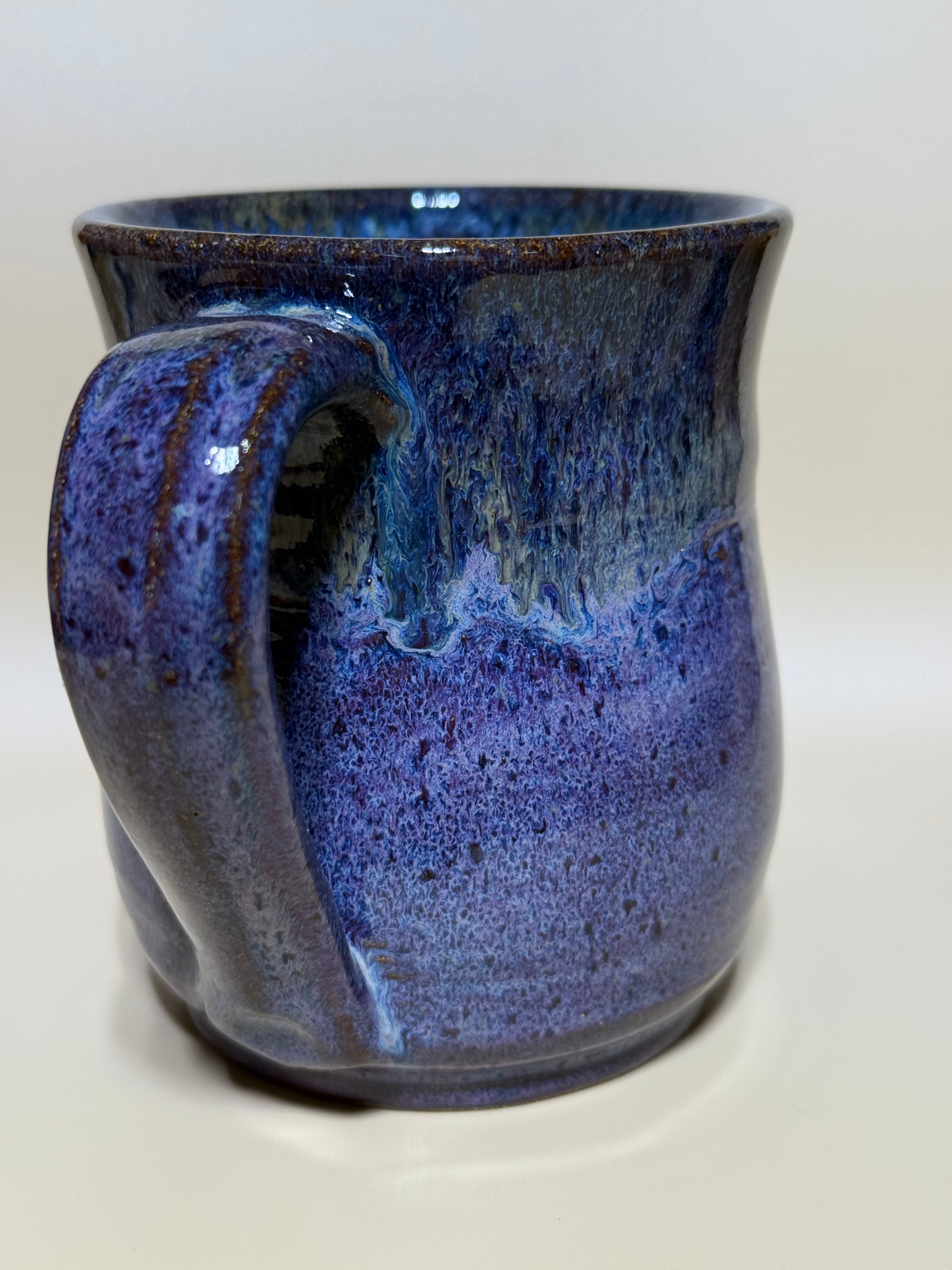 Purple and gold mug on speckled clay. Handmade 10-12 oz